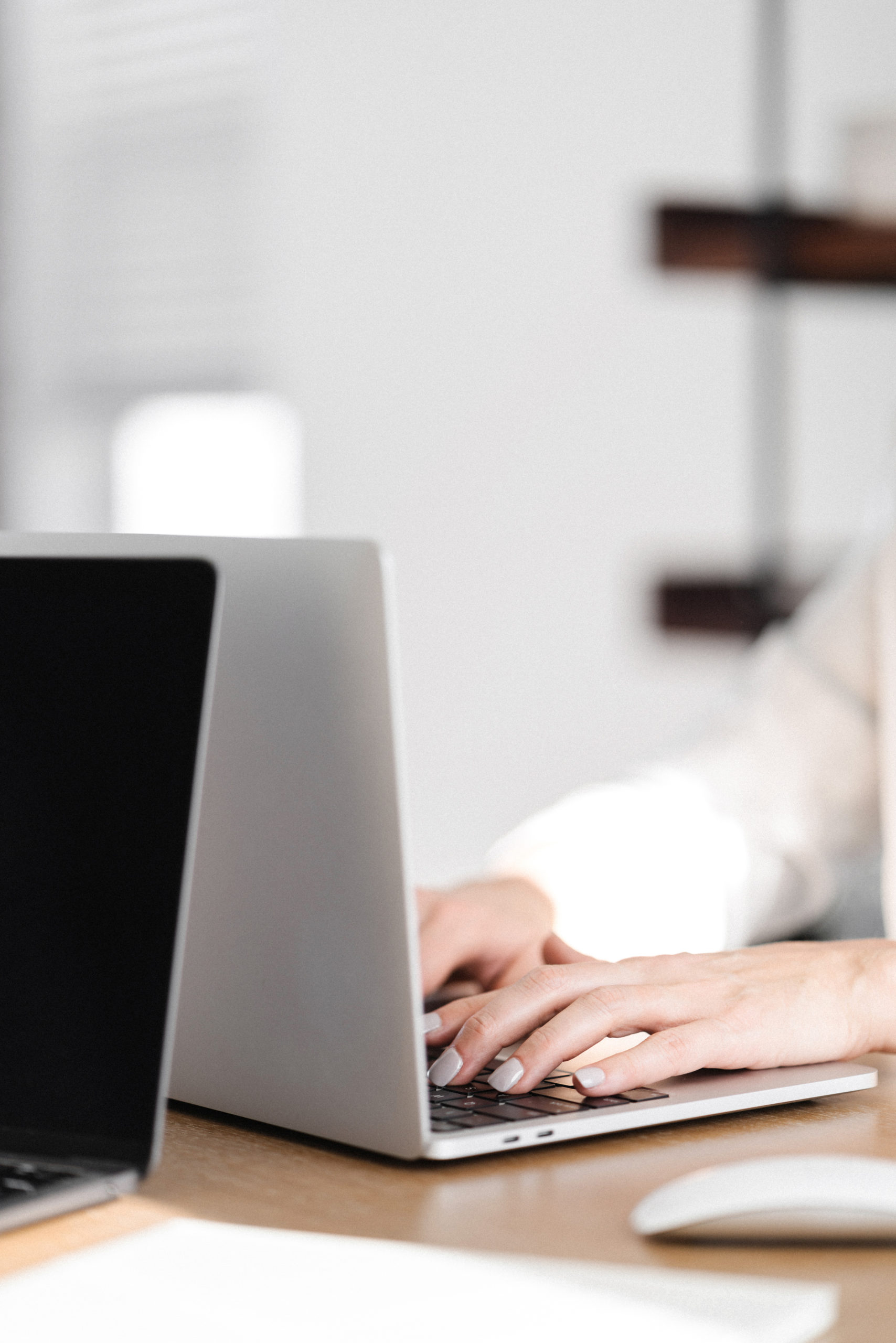 Stock photo of woman typing on laptop